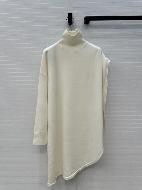 Alaia Irregularly Cut Wool Knit Blouse with Lazy and Elegant Style