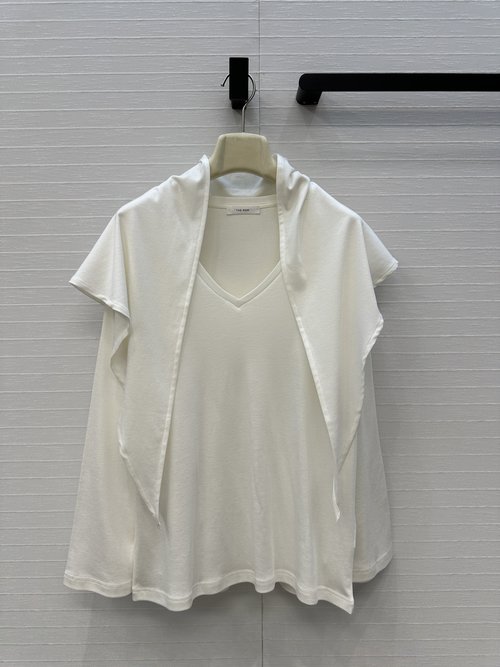 The Row Exclusive Premiere: Row Style Tassel Shawl for Layered Elegance