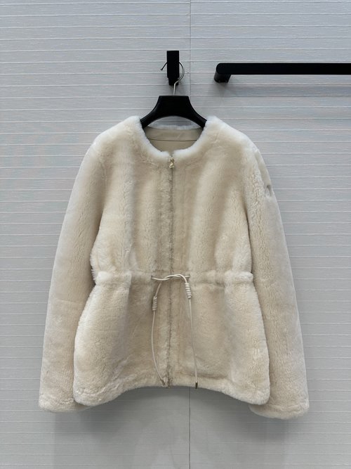 Chanel Exclusive Merino Fur Coat with Down Back and Timeless Design