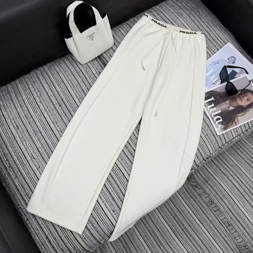 Prada Elastic-Waist Curved Jeans with Triangle Pocket