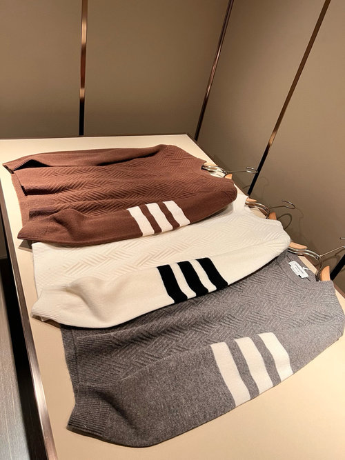 Thom Browne Luxury Knit Wool Sweater Featuring Iconic Stripes